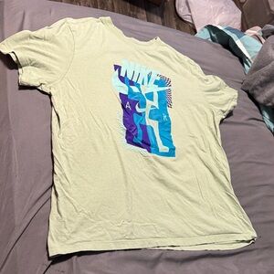 Nike Tee with Blue and Purple Graphic on Light Green